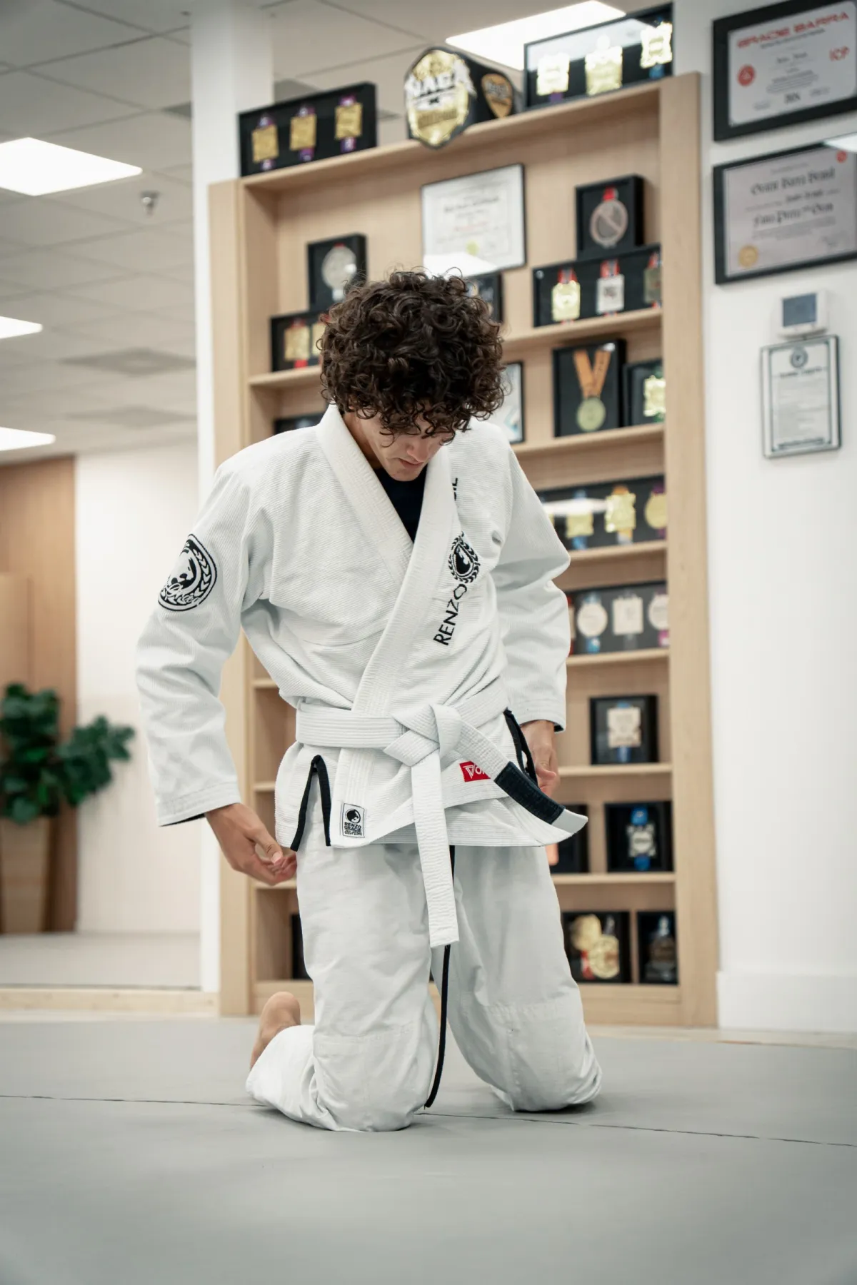 Young student training Jiu-Jitsu on the mat at Renzo Gracie West Boca Raton