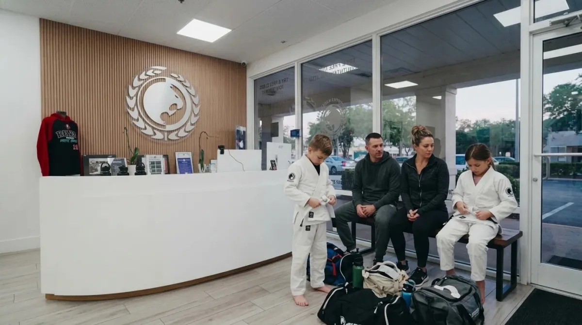 Parents sitting on a bench watching their children's class