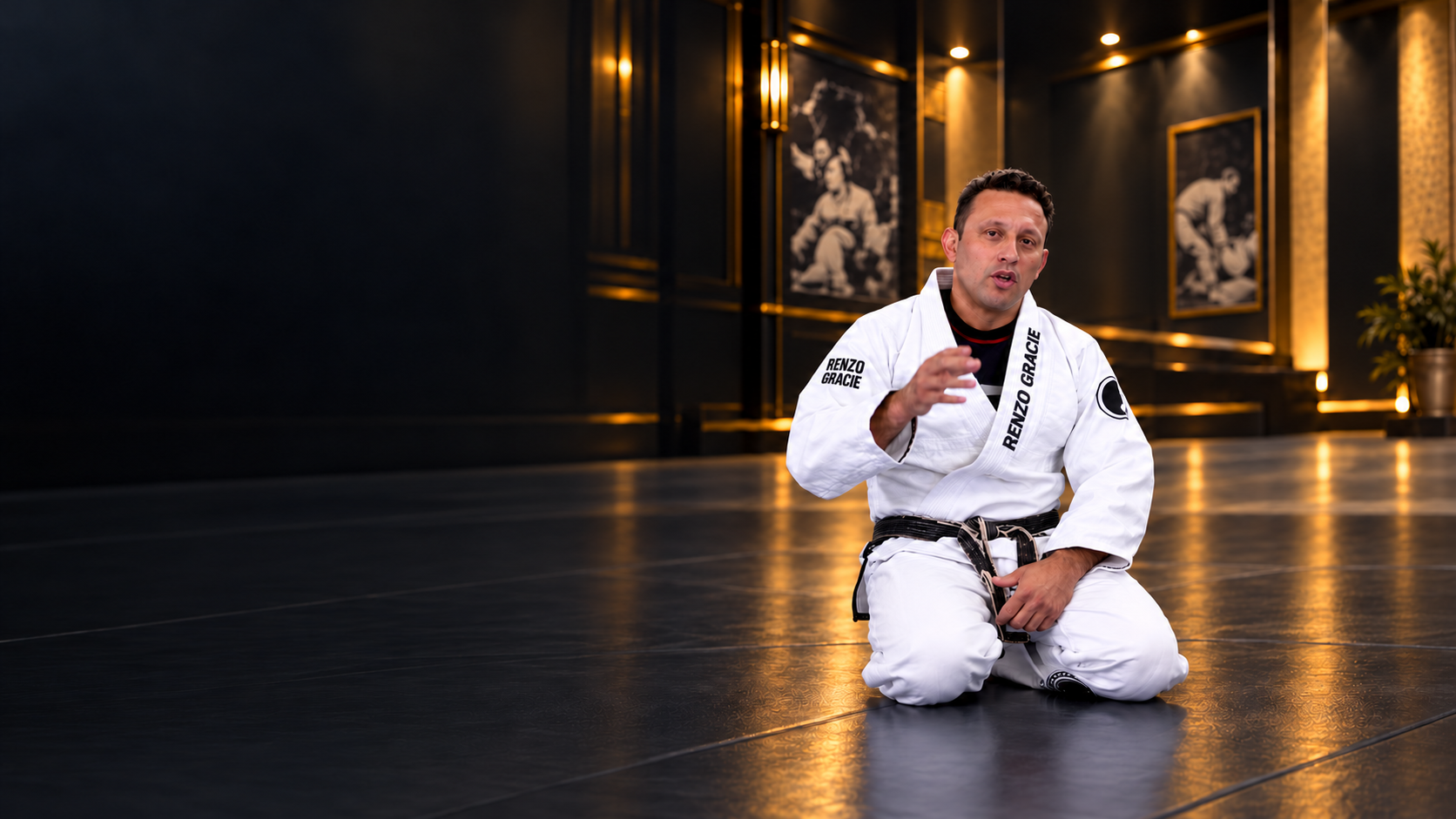 Renzo Gracie, black belt, teaching on the mat