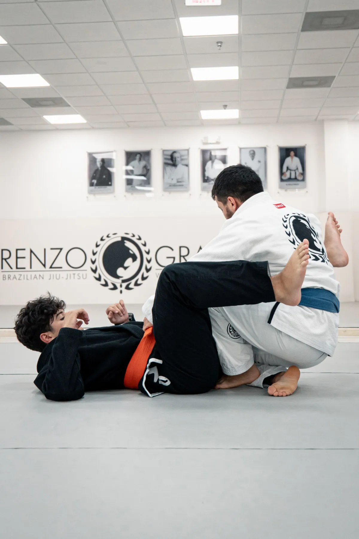 Young student training Jiu-Jitsu on the mat at Renzo Gracie West Boca Raton