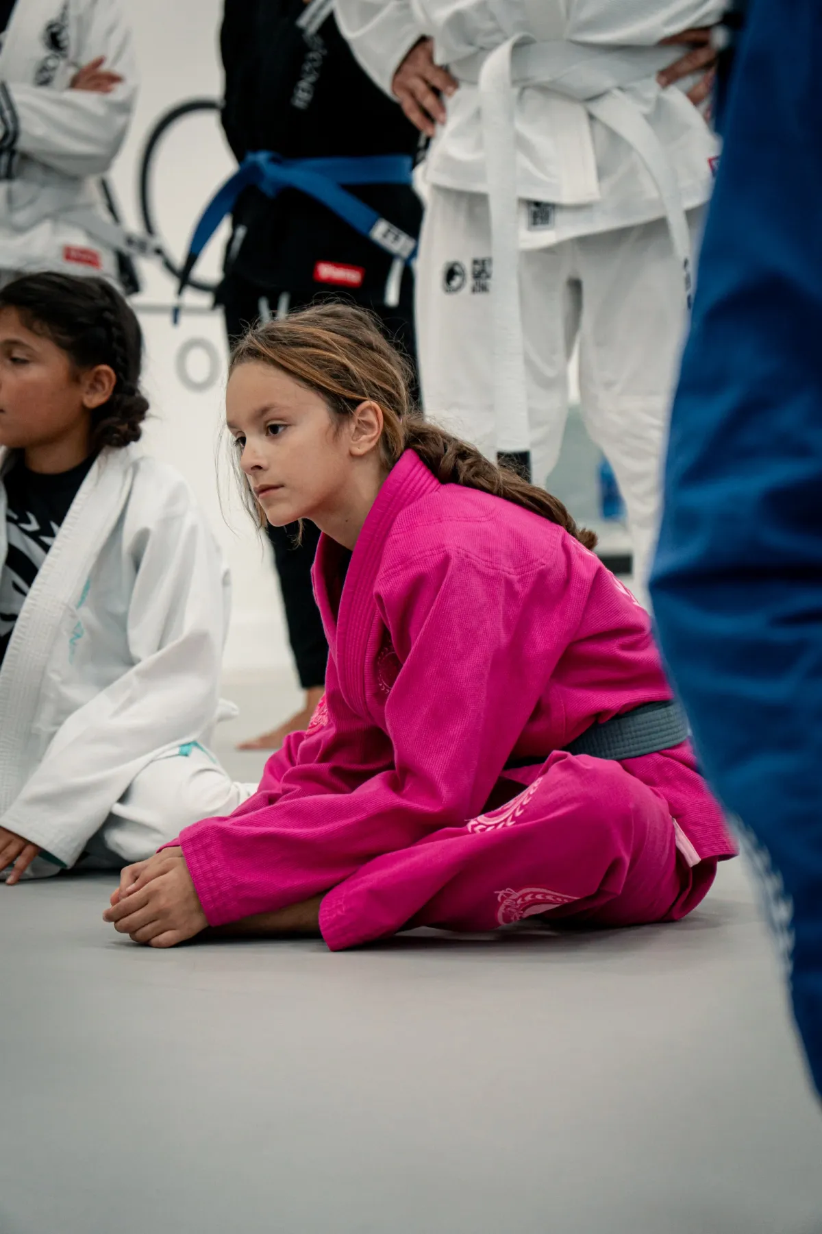 Kids smiling in kimonos during a class at Renzo Gracie West Boca Raton